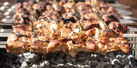 barbecue shish kebab on skewers fry (meal outdoors) - cuisine.  Food background
