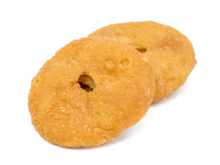 Indian Traditional Sweet Kachori Also Know As Mawa Kachori, Kachauri or Kachodi, Stuffed Kachori With Condensed Milk, Cheese and Dry Fruits And Served With Sugar Syrup isolated on White Background