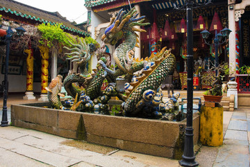 A pond depicting dragons in the grounds of the Cantonese Assembly Hall, also known as Quang Trieu...