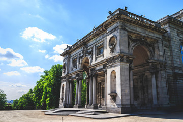 Obraz premium Royal Palace of Laeken in the north of Brussels. Landscape of grass field and green environment