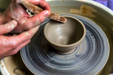 Working on potter's wheel close