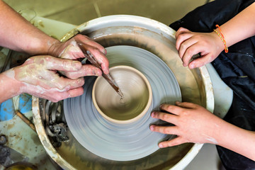 Working on potter's wheel close