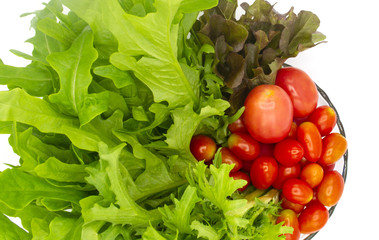 fresh organic of colorful mix vegetables isolate on white background, green and red lettuce, mizuna lettuce, cherry tomato, ingredients are preparing in the blow for cooking, healty
