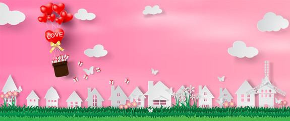 Paper art and craft of Valentine's day website banner with text love cityscape and ballon,clouds,heart,home.Vector illustration
