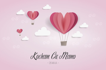 Fototapeta na wymiar Dzień Matki 26 Maja - balony w kształcie serca na niebie z napisem „Kocham Cię Mamo”