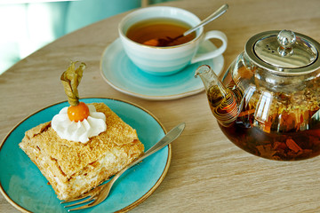 puff pastry with cream on a wooden table