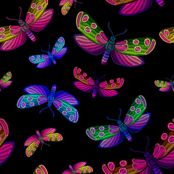 Decorative seamless multicolor pattern with  butterfly stylized texture of embroidery, imitation of multicolor ornamental satin stitch. Vector pattern for printing on fabric, clothes, t-shirt. 