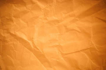 Brown crumpled paper background.