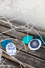 Beautiful and colorful stones on the wood