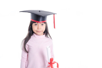 Happy Asian school kid graduate in graduation cap