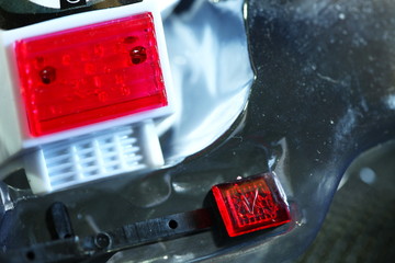 Turn signal indicator light of motorcycle model scene.