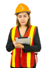 Engineering woman stands holding and touches the tablet over background is white.