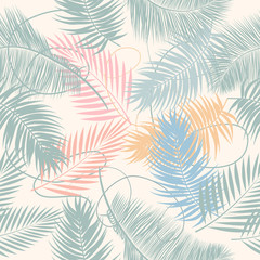 Fototapeta na wymiar Tropical seamless pattern with exotic palm leaves.