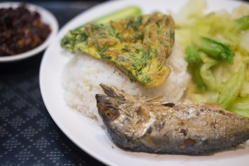 Omelet with acasia vegetable and fried mackerel