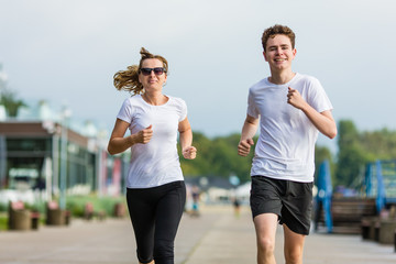 Man and woman running