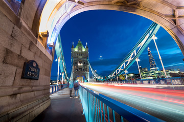 On tower bridge at night with moon