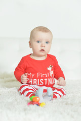 Adorable baby boy on background