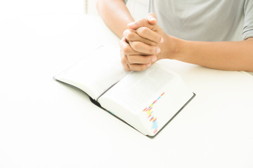 woman hands praying to god with the bible. begging for forgiveness and believe in goodness.
