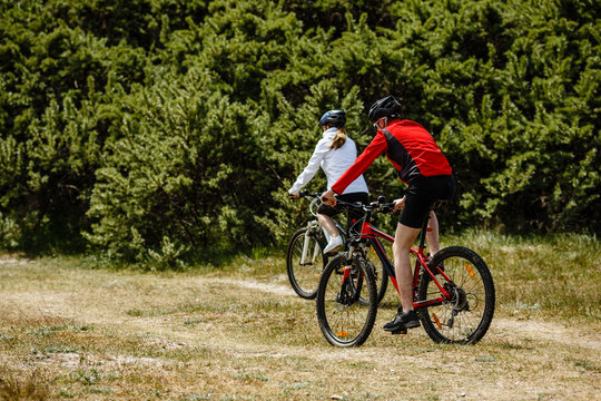 Healthy lifestyle - people riding bicycles