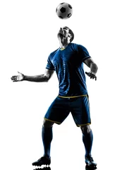 Poster one caucasian soccer player man playing in silhouette isolated on white background © snaptitude