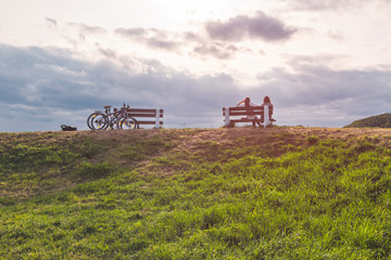 GDANSK, POLAND, AUGUST 2014. Girls take rest on the grass hill