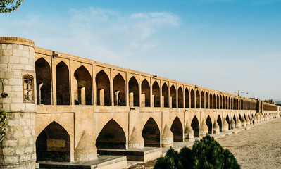 Fototapeta premium Early 17th c, Si-o-seh Pol, also known as Allahverdi Khan Bridge, in Isfahan, iran is made up of 33 arches in a row and measures 295meters long and 13.75meters wide, crossing the River Zayandeh-Roud