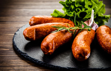 Raw sausages with and vegetables
