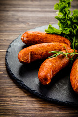 Raw sausages with and vegetables