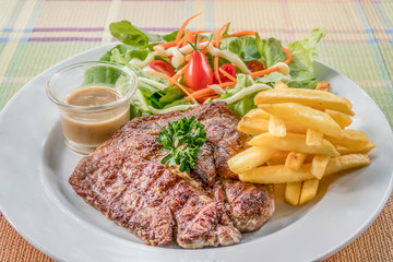 Grilled steak on dish