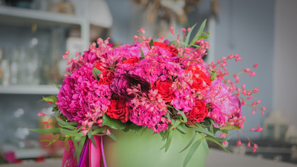 Beautiful wedding bouquet in florist studio. Floristry and handmade concept