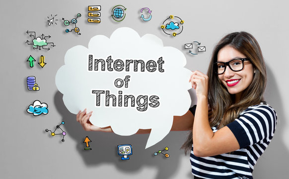 Internet of Things text with young woman holding a speech bubble