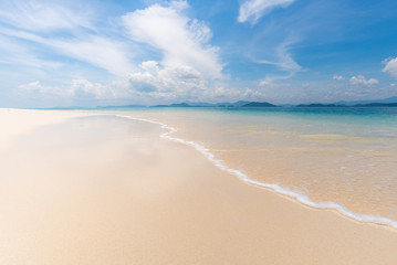 Fototapeta na wymiar Empty tropical beach background. Horizon with sky and white sand at Kang Kao Island,Andaman sea :Ranong Thailand. Day light blue sky