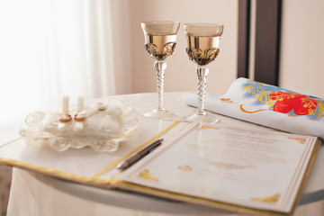 wedding accessories rings wooden butterfly and bouquet