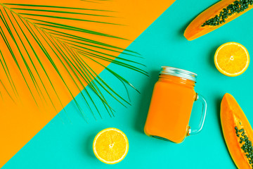 Smoothies / cocktail / juice on a bright pastel background.