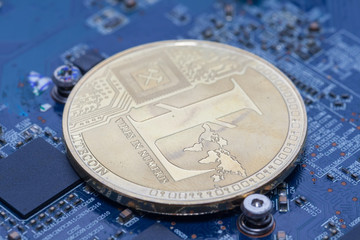 close up of bitcoin on Printed circuit board