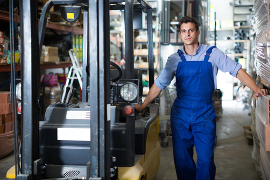 Portrait of  sellerman in uniform on his workplace