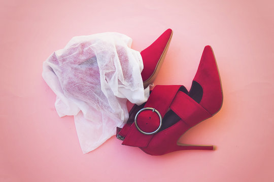 beautiful red pump hight heeled on pink background