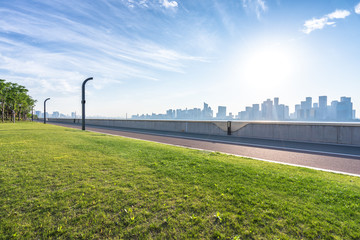 panoramic cityskyline with empty road