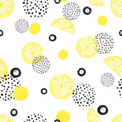 Abstract seamless lemon pattern in yellow and black color. Citrus Fruits and dots on white background.