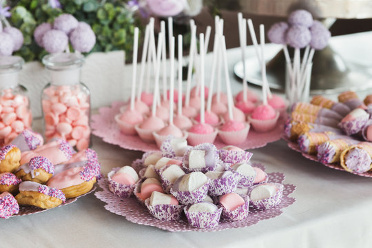Dessert table for any holiday at wooden background