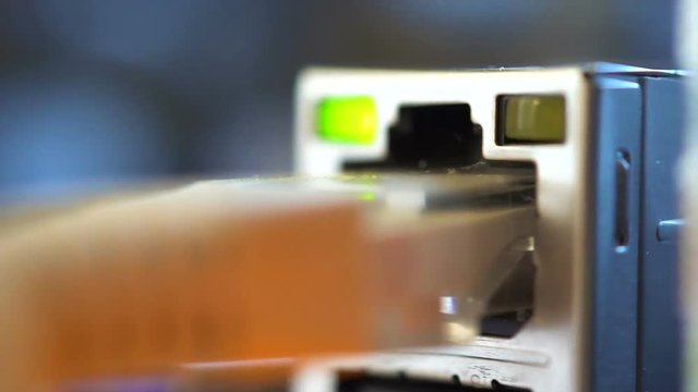 Ethernet port and other ports for connection of devices to the motherboard. Very smooth dolly shot. Close view.