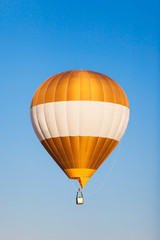 Fototapeta premium Colorful hot air balloon fly over the blue sky