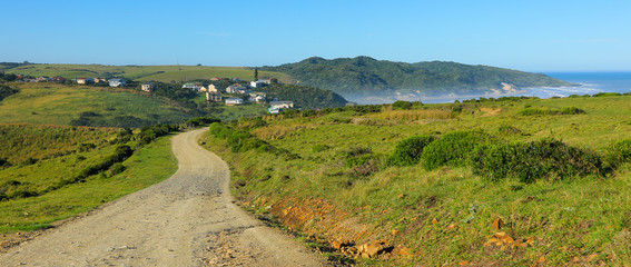 Fototapeta na wymiar Dirt road going down to the beach of Morgans Bay near Kei Mouth, East London Coast Nature Reserve, Eastern Cape province, South Africa