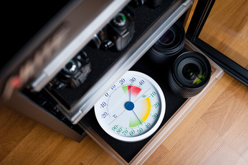 analog Thermometer and Hygrometer and photography equipment