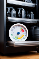 analog Thermometer and Hygrometer and photography equipment