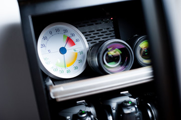 analog Thermometer and Hygrometer and photography equipment