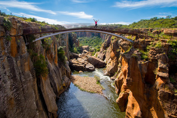 Bridge over Bourke's Luck Potholes geological formation in the Blyde River Canyon area, Mpumalanga district, South Africa
