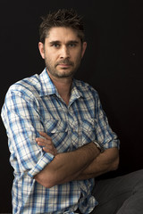 Middle Age Man with blue eyes and striking features