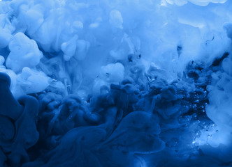 Acrylic colors in water. Abstract background.