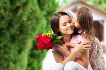 Naklejka premium Young woman with little girl